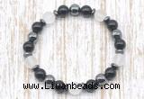 CGB8320 8mm matte white crystal, black onyx & hematite energy bracelet
