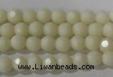 CTU1440 15.5 inches 4mm faceted round synthetic turquoise beads