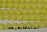 CTU2523 15.5 inches 4mm faceted round synthetic turquoise beads